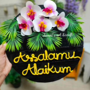 wooden nameplate with flowers