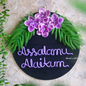 wooden nameplate with flowers